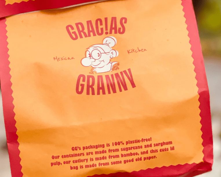 A Gracias Granny paper takeaway bag